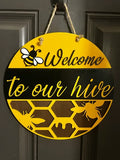 Welcome to our Hive door sign